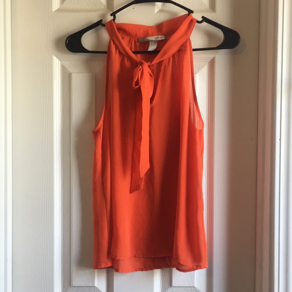 Orange sleeveless blouse